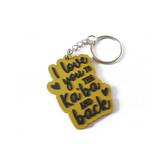 Geel sleutelhanger met I love you to the Kaaba and back tekst en hartaccenten
